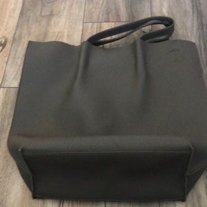 Grey leather hobo bag with dark silver hardware